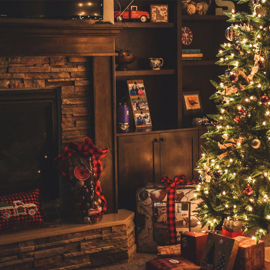 Family enjoying seasonal activities around an electric fireplace