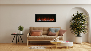 Wall-mounted electric fireplace on a cream wall above a tan sofa in a living room