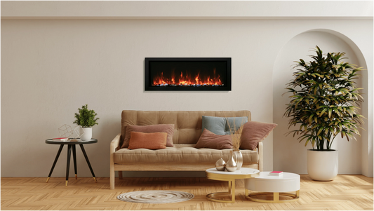 Wall-mounted electric fireplace on a cream wall above a tan sofa in a living room