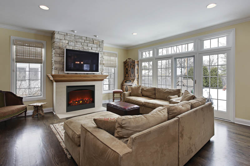 Amantii Zero Clearance electric fireplace with arched surround and log set