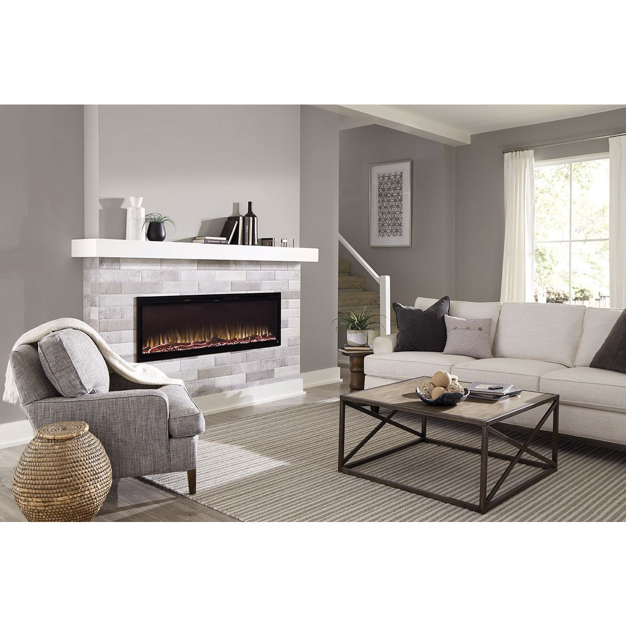 Cozy living room with Sideline Elite 60" Recessed Electric Fireplace with green flame– Very Good Fireplaces.